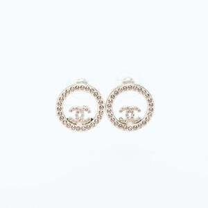 CHANEL Gold Logo Earrings